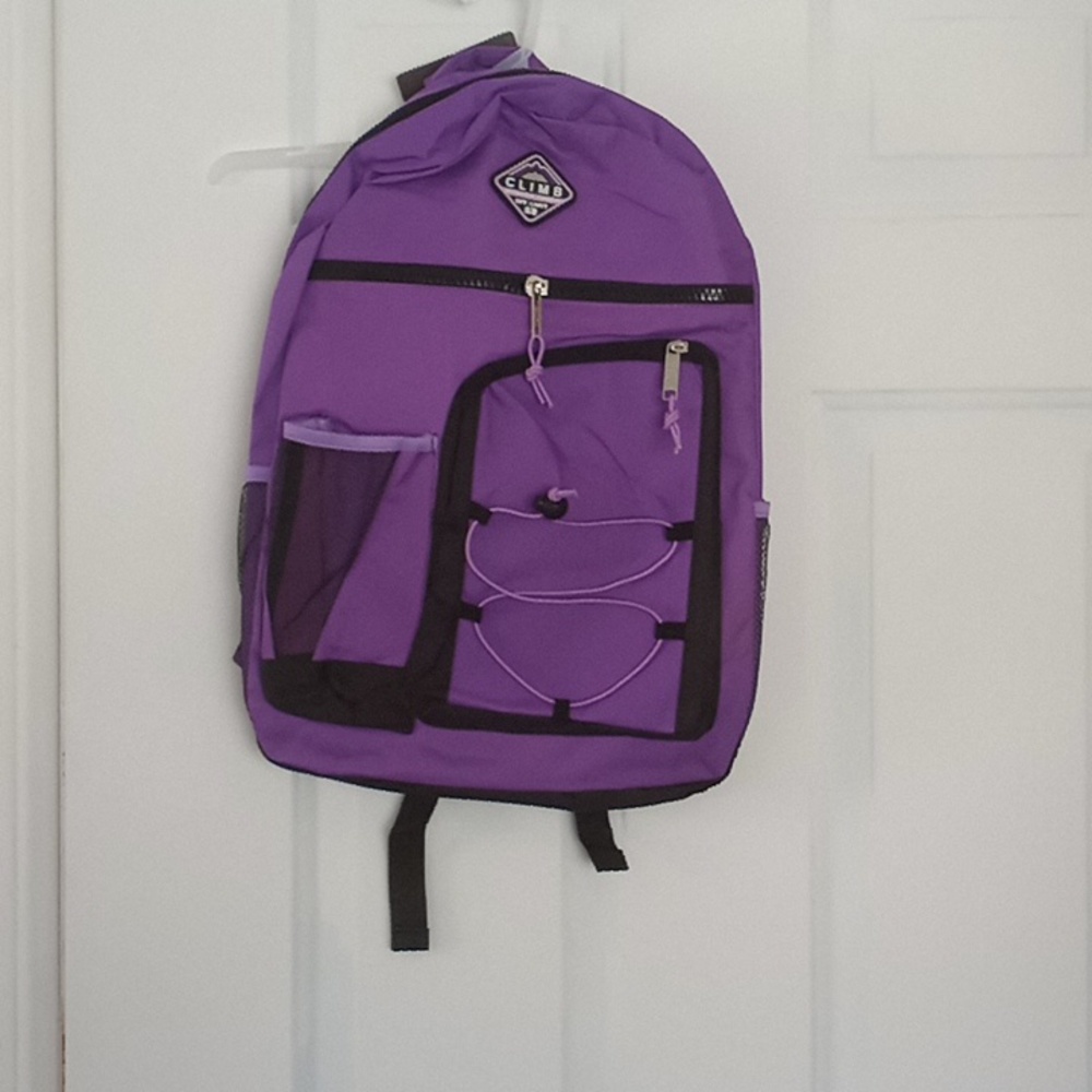 Purple backpack. Mountain Terrain. NWT could be for women also